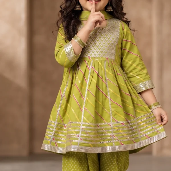 Little girl wearing a green ethnic flared kurta with intricate gota work, paired with a matching Patiala salwar and chiffon dupatta for festive wear.